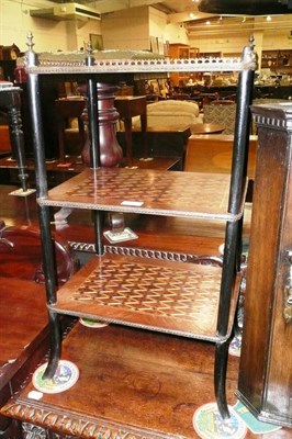 Lot 652 - A French parquetry inlaid etagere