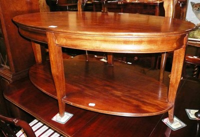 Lot 659 - A modern oval two tier coffee table