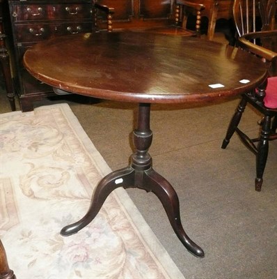 Lot 677 - Georgian mahogany bird cage action tripod table