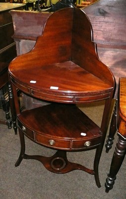 Lot 683 - A 19th century mahogany two tier corner washstand