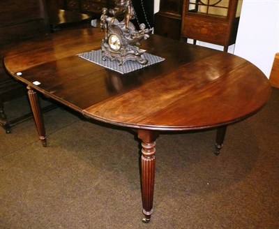 Lot 685 - 19th century mahogany table with two leaves