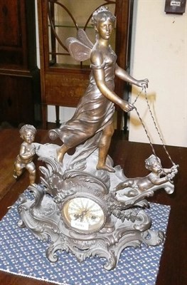 Lot 686 - Figural mantel clock modelled as a winged lady riding a chariot with attendants