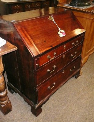 Lot 689 - A George III mahogany bureau of small proportions