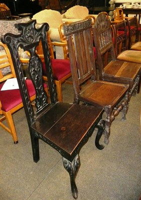 Lot 693 - Two 18th century oak chairs and a similar Victorian example