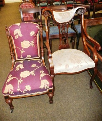 Lot 705 - An Edwardian mahogany elbow chair and an upholstered nursing chair