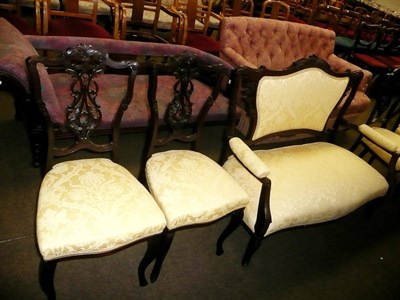 Lot 708 - A late Victorian mahogany-framed salon suite with yellow upholstery