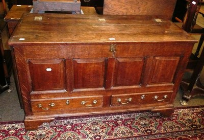 Lot 722 - An 18th century oak coffer with two drawers below (later converted)