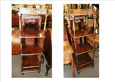 Lot 725 - A pair of reproduction four tier whatnots