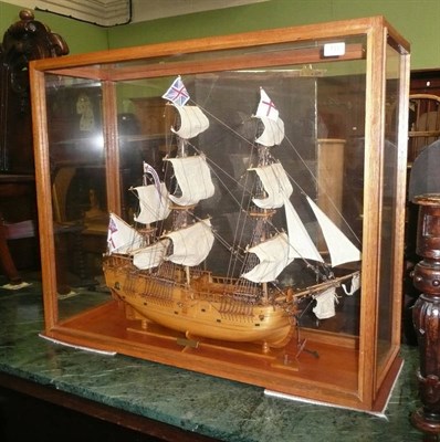 Lot 733 - A wooden model of a galleon in a glazed display case