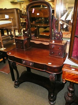 Lot 737 - A Victorian mahogany dressing table and mirror