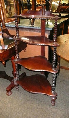 Lot 741 - A mahogany four tier corner whatnot