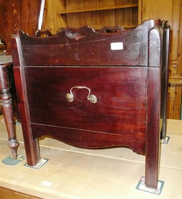 Lot 744 - A mahogany commode