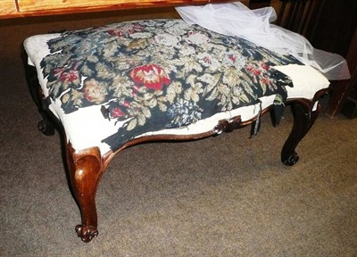 Lot 745 - A large Victorian over-stuffed footstool on cabriole legs