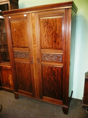 Lot 766 - Mahogany two door wardrobe