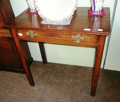 Lot 775 - A Georgian oak single drawer side table