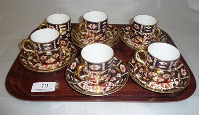 Lot 10 - A set of six Royal Crown Derby coffee cans and saucers