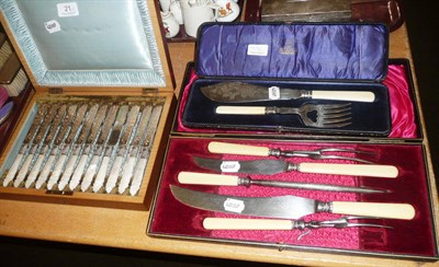 Lot 21 - Cased set of twelve plated and mother of pearl fruit knives and forks, cased set of fish...