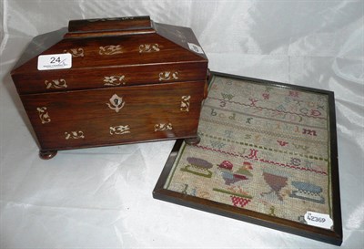 Lot 24 - Rosewood and mother of pearl inlaid tea caddy and a framed sampler