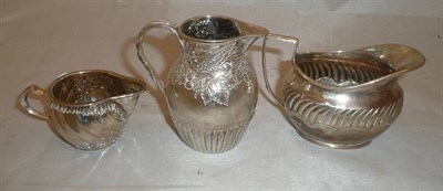 Lot 44 - Three silver milk/cream jugs