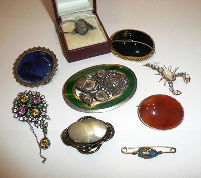 Lot 61 - A moss agate ring, a cornelian brooch, a silver green enamelled brooch, a coloured and white...