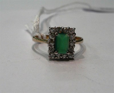 Lot 76 - A 9ct gold emerald and diamond cluster ring