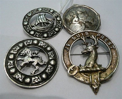 Lot 81 - A silver brooch and three others