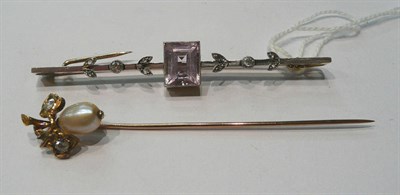 Lot 88 - Amethyst and diamond bar brooch with platinum front and a diamond set stick pin