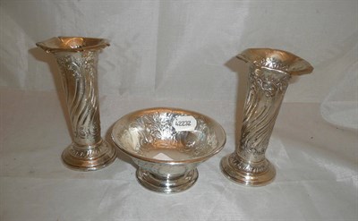 Lot 111 - Pair of silver trumpet vases and a silver sugar (3)
