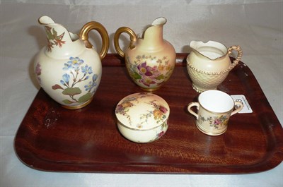 Lot 123 - Five items of Royal Worcester blush ivory - three jugs, a box and cover and a twin handled...