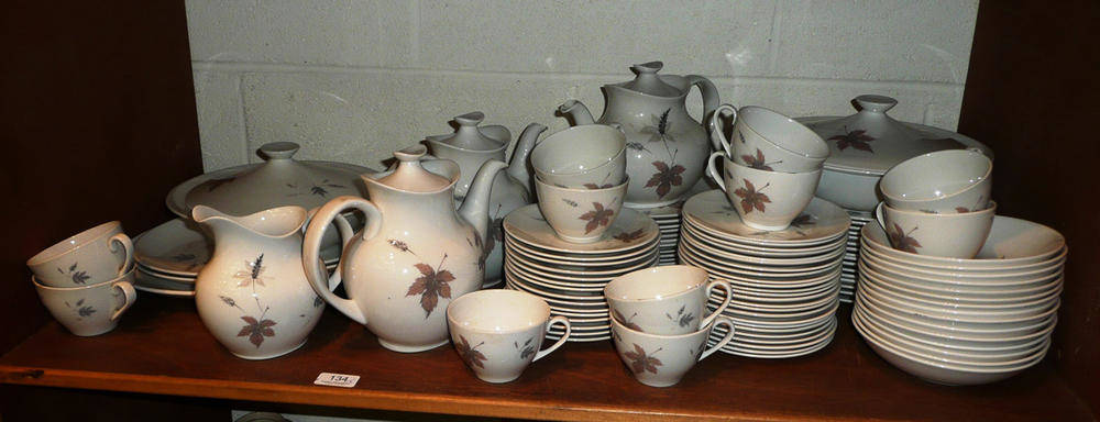 Lot 134 - Royal Doulton 'Tumbling Leaves' dinner, tea and coffee service on two shelves