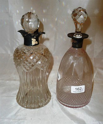 Lot 162 - Two silver mounted decanters with stoppers
