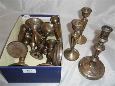 Lot 184 - Silver candlesticks and a pair of Indian white metal candlesticks