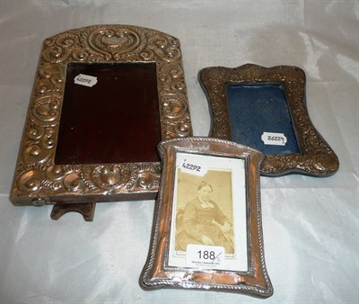 Lot 188 - Two silver and one white metal photograph frame (3)