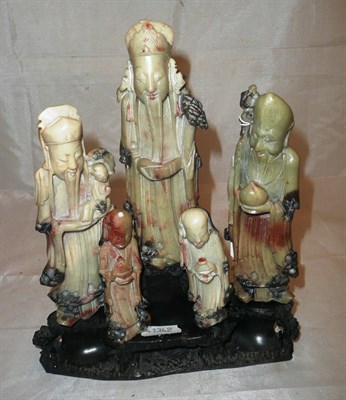 Lot 190 - A set of five soapstone Chinese deities on stand