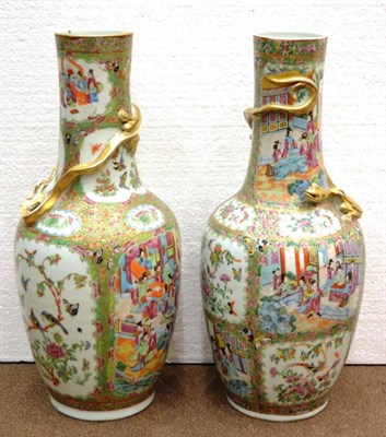 Lot 68A - A Matched Pair of Cantonese Porcelain Large Bottle Vases, mid 19th century, the cylindrical...