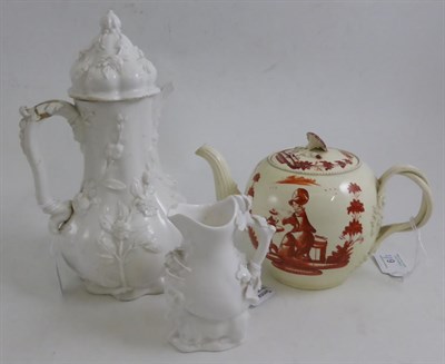 Lot 6 - A Creamware Teapot and Cover, circa 1760, painted in monochrome red with Miss Pitt taking tea, 13cm
