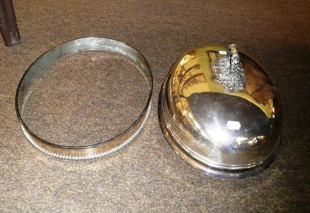 Lot 479 - A silver plated meat dome and associated ring (2)