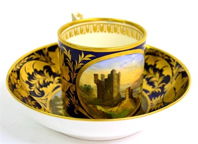 Lot 16 - A Derby Porcelain Coffee Can and Saucer, circa 1790, painted with Brough Castle and Weir Bridge...