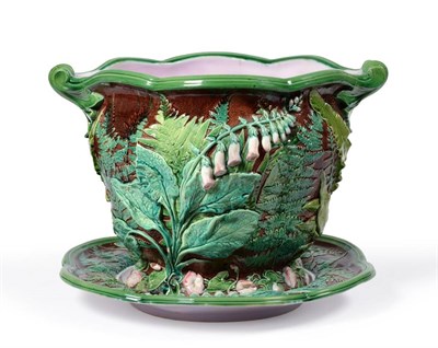 Lot 29 - A Minton Majolica Jardinière and Stand, dated 1868, of lobed baluster form with leaf scroll...