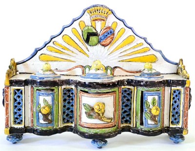 Lot 51 - A French Faience Inkstand, late 18th/19th century, modelled as a sideboard, with fluted arched...