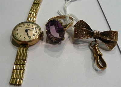 Lot 9 - A 9ct gold amethyst ring, a 9ct gold lady's wristwatch (a.f.) and a bow brooch with fob...