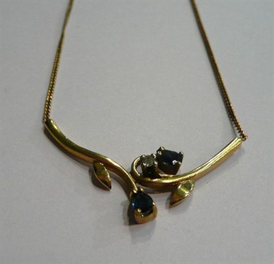Lot 11 - A diamond and sapphire necklace