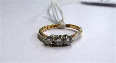Lot 37 - A three stone platinum diamond set ring