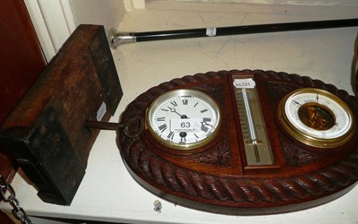 Lot 63 - Oak cased aneroid barometer/timepiece, a Victorian lock and an ebonised cane with silver pommel