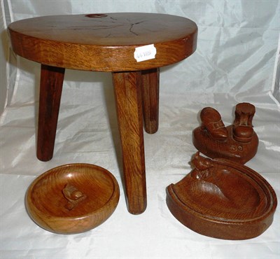 Lot 79 - A 'Wrenman' stool, ash tray, horse shoe ash tray and carving