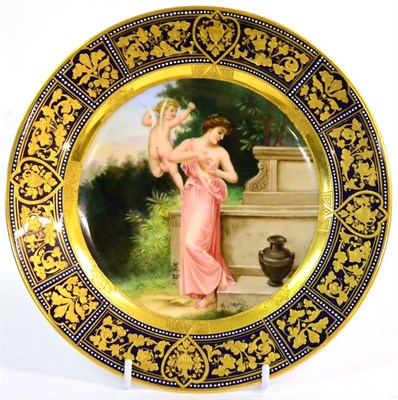 Lot 62 - A  "Vienna " Porcelain Plate, late 19th century, decorated with Cupid and Psyche in a garden within