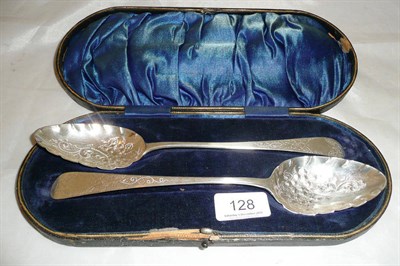 Lot 128 - A pair of silver Georgian cased spoons with Newcastle hallmark, makers initials 'DL', 3.76oz