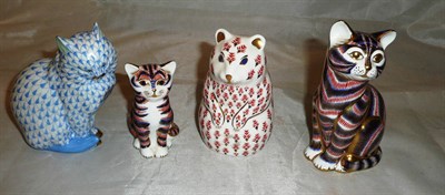 Lot 130 - Three Royal Crown Derby paperweights and a Herand cat (4)