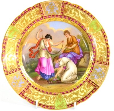 Lot 64 - A Vienna Style Porcelain Plate, late 19th century, decorated with three classical figures in a...