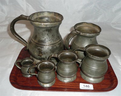 Lot 146 - Six pewter measures